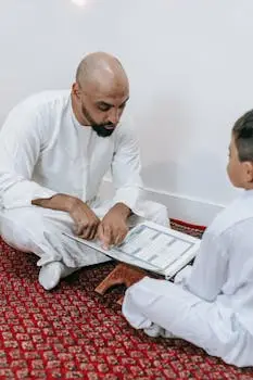 Father and son reading religious text together, fostering faith and learning.